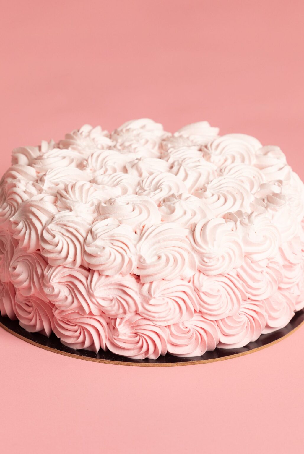 Dettaglio delle rose di panna rosa della Smash Cake
